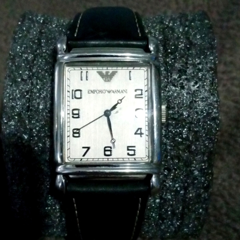 Emporio Armani watch w/original box and tag. Battery will be replaced upon order